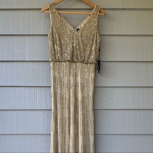 Brand new long elegant beaded dress.